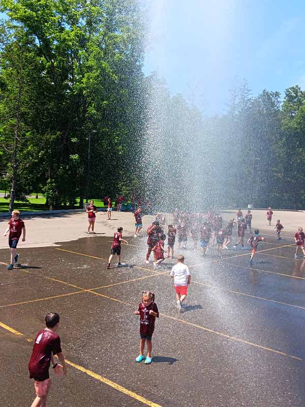 Some education and cooling off fun with the children at Our Lady of Sorrows